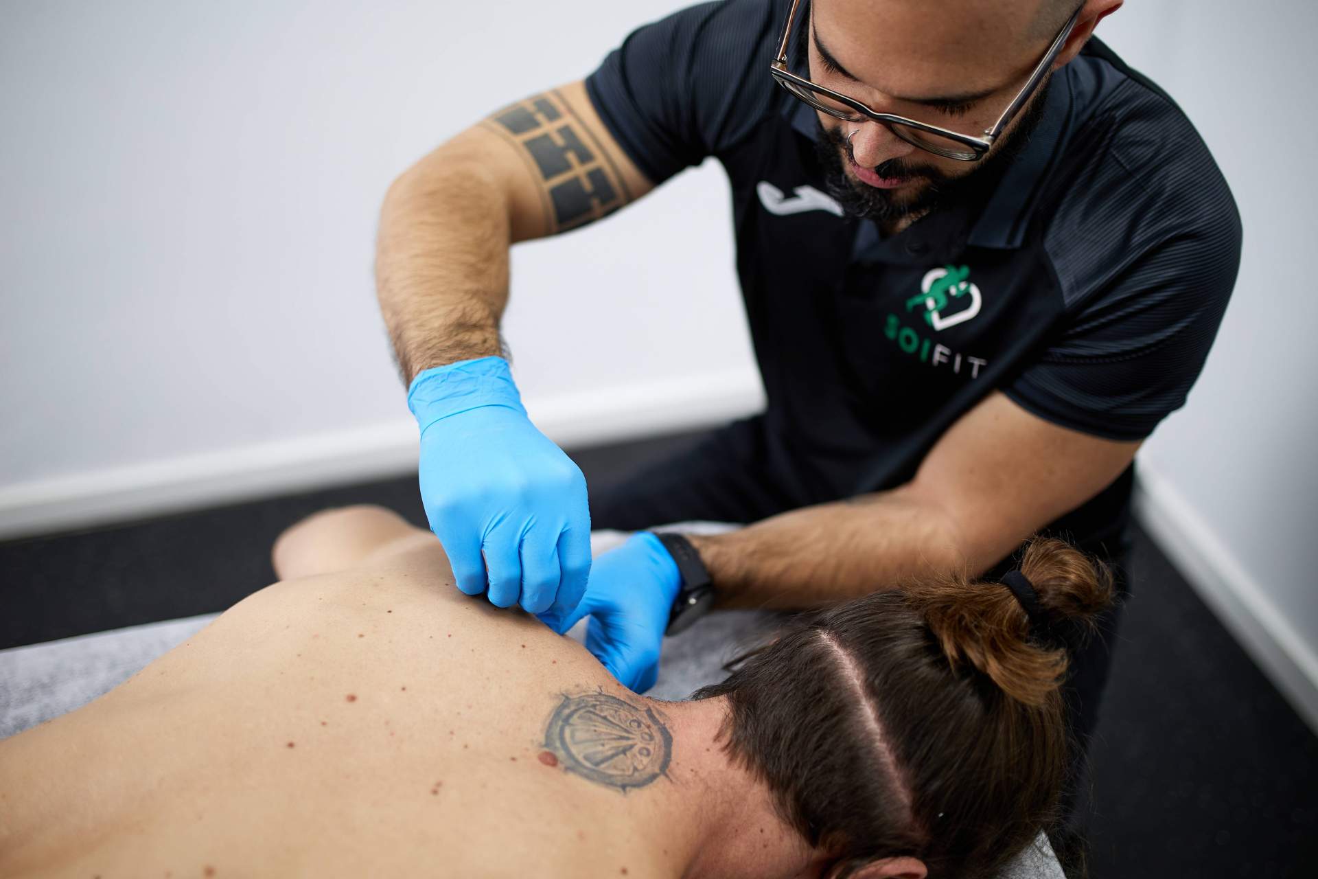 Descarga muscular y preparación para la Maratón Valencia de la mano de profesionales